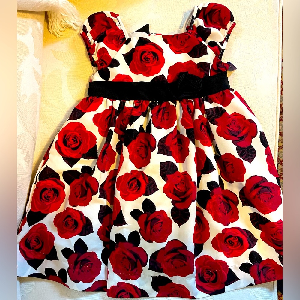Dress- Festive holiday dress. Like new. Red flowers with black bow. 2 T